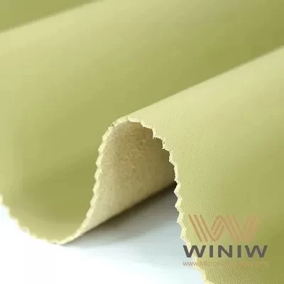 py144706825-synthetic_microfiber_faux_leather_fabric_embossed_for_car_upholstery.webp